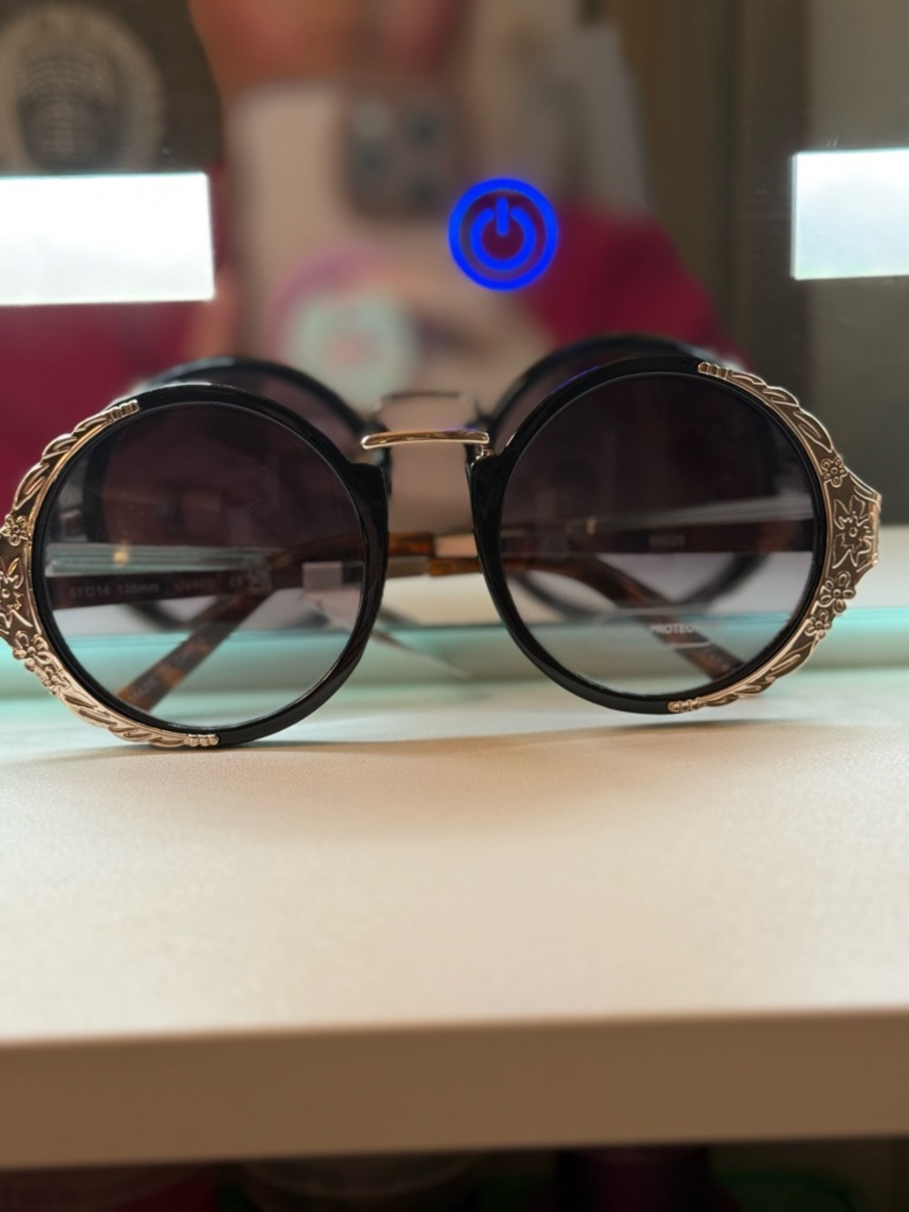 Round Black Sunglasses with Decorative Gold Filigree - Women's Accessories
